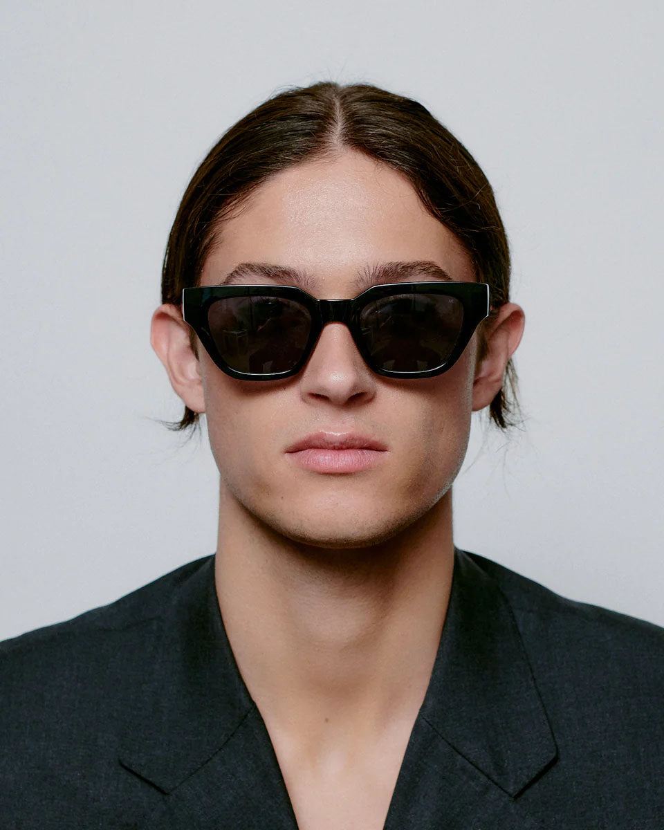 A. KJAERBEDE Kaws black sunglasses
