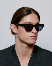 A. KJAERBEDE Kaws black sunglasses