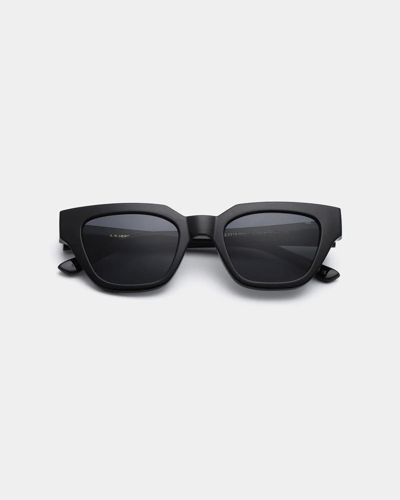 A. KJAERBEDE Kaws black sunglasses
