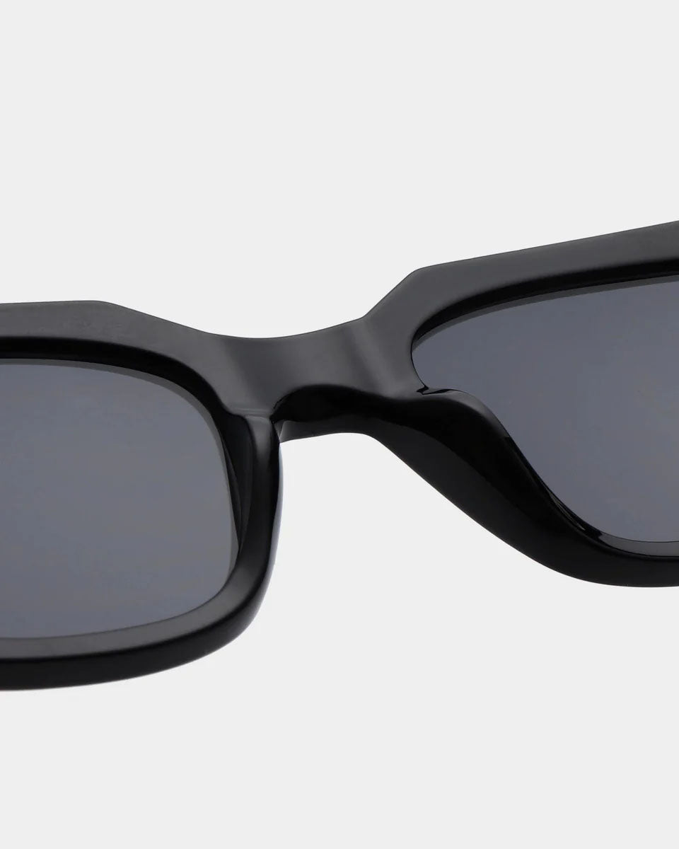 A. KJAERBEDE Kaws black sunglasses