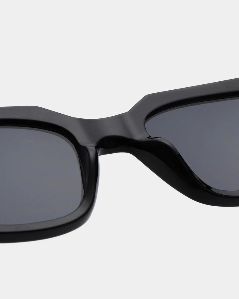 A. KJAERBEDE Kaws black sunglasses