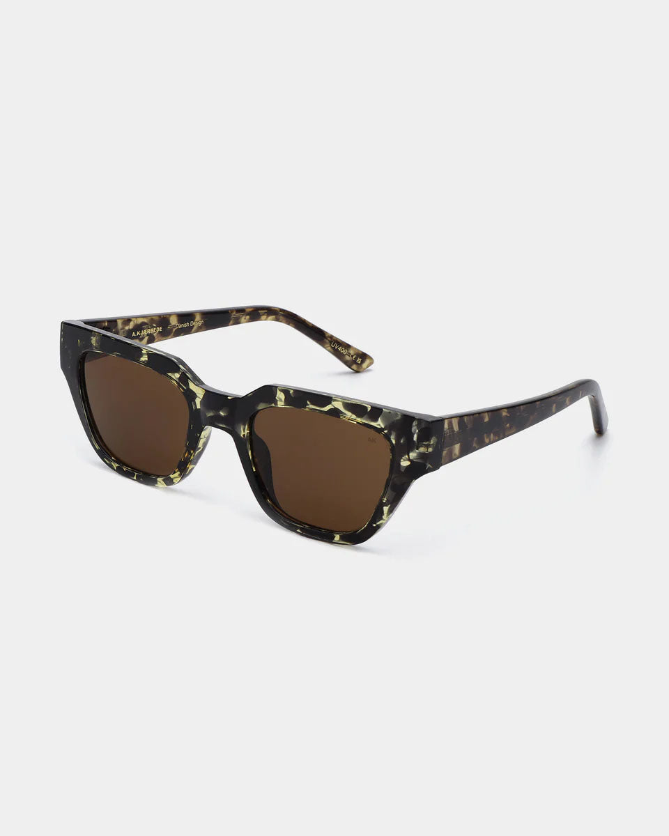 A. KJAERBEDE Kaws black yellow sunglasses