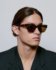 A. KJAERBEDE Kaws black yellow sunglasses