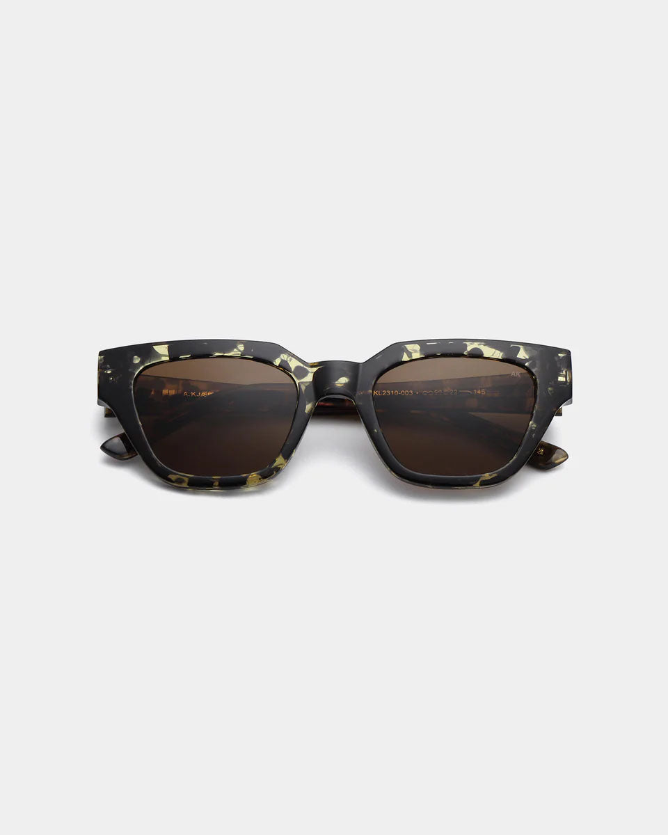 A. KJAERBEDE Kaws black yellow sunglasses