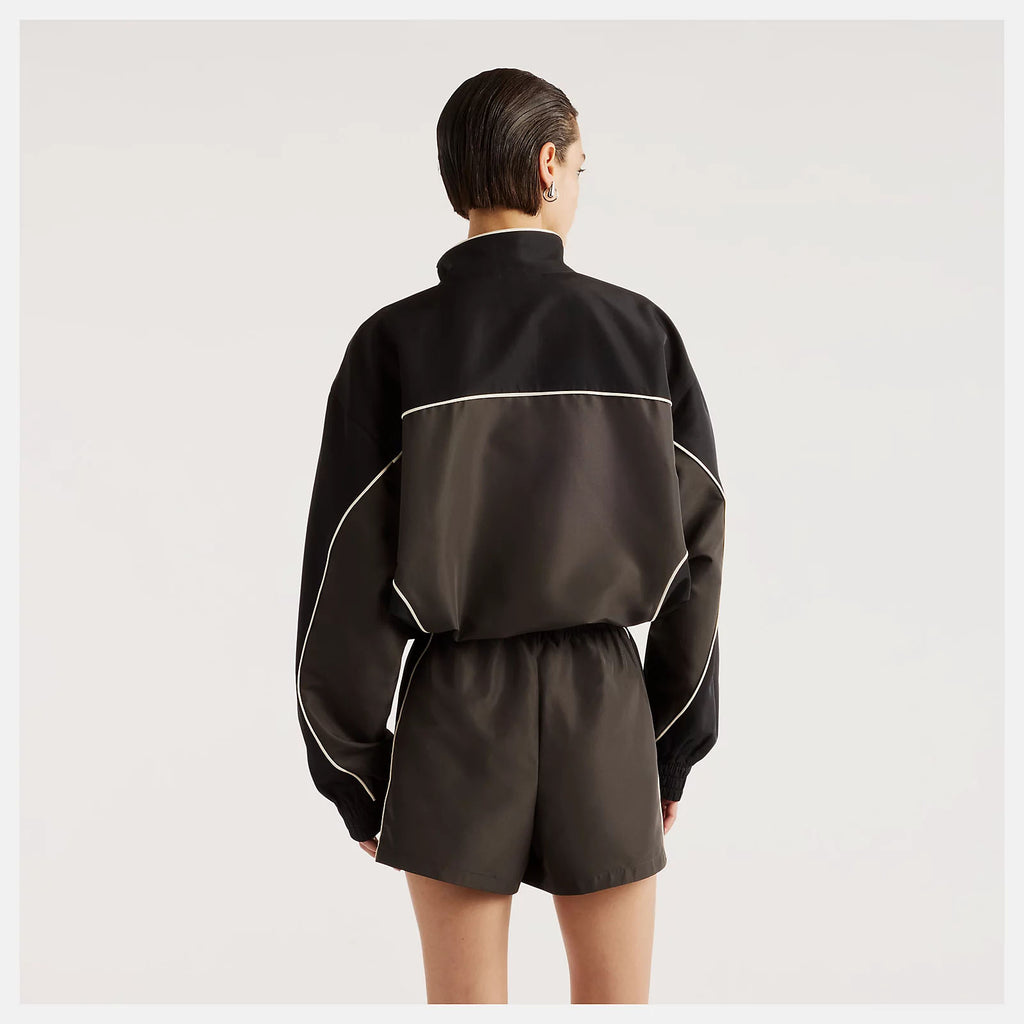 NEW BALANCE Trackside woven jacket black cement