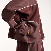 NEW BALANCE Trackside woven jacket cherry leather