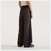NEW BALANCE Trackside woven pant black cement