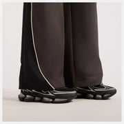 NEW BALANCE Trackside woven pant black cement