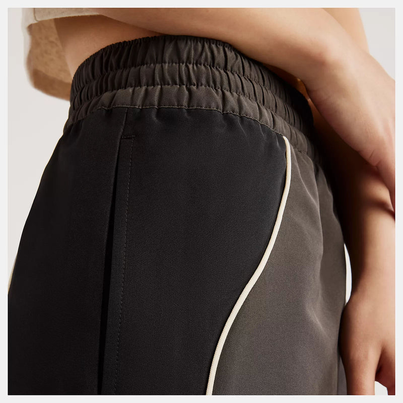 NEW BALANCE Trackside woven pant black cement