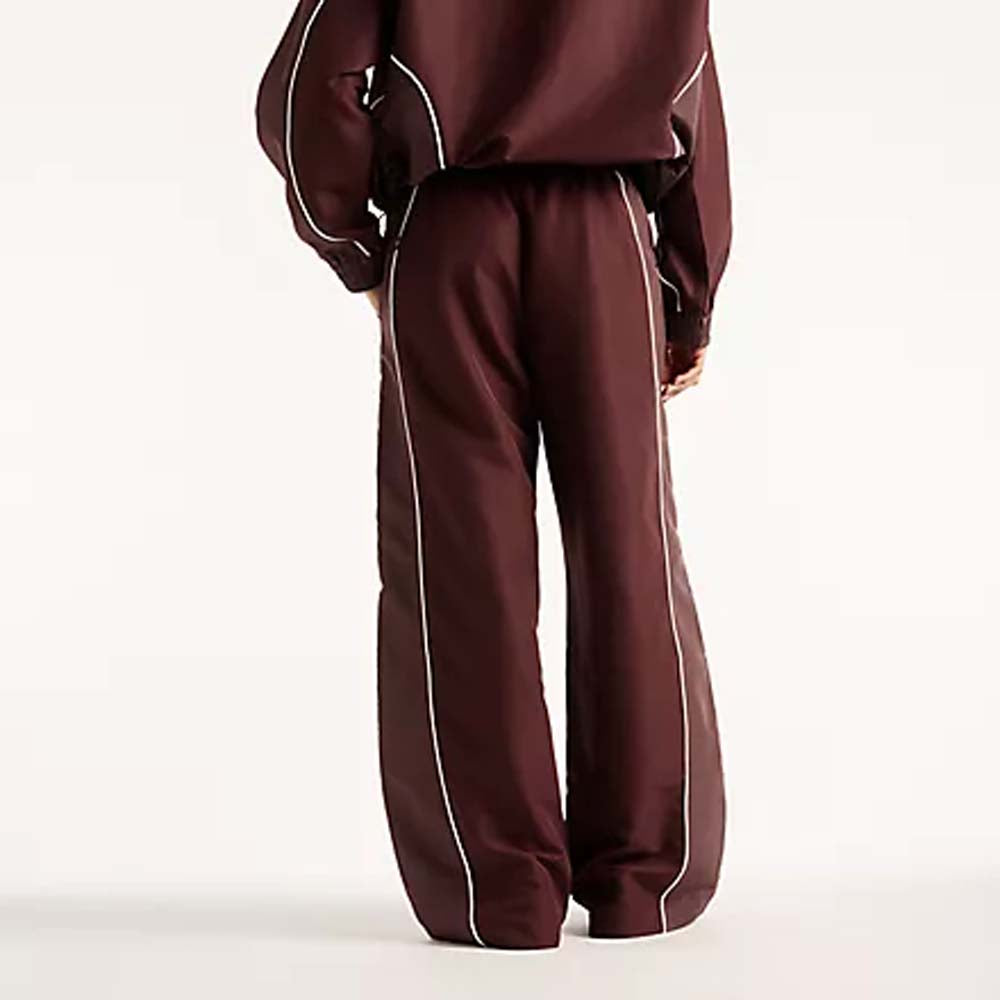 NEW BALANCE Trackside woven pant cherry leather