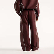 NEW BALANCE Trackside woven pant cherry leather