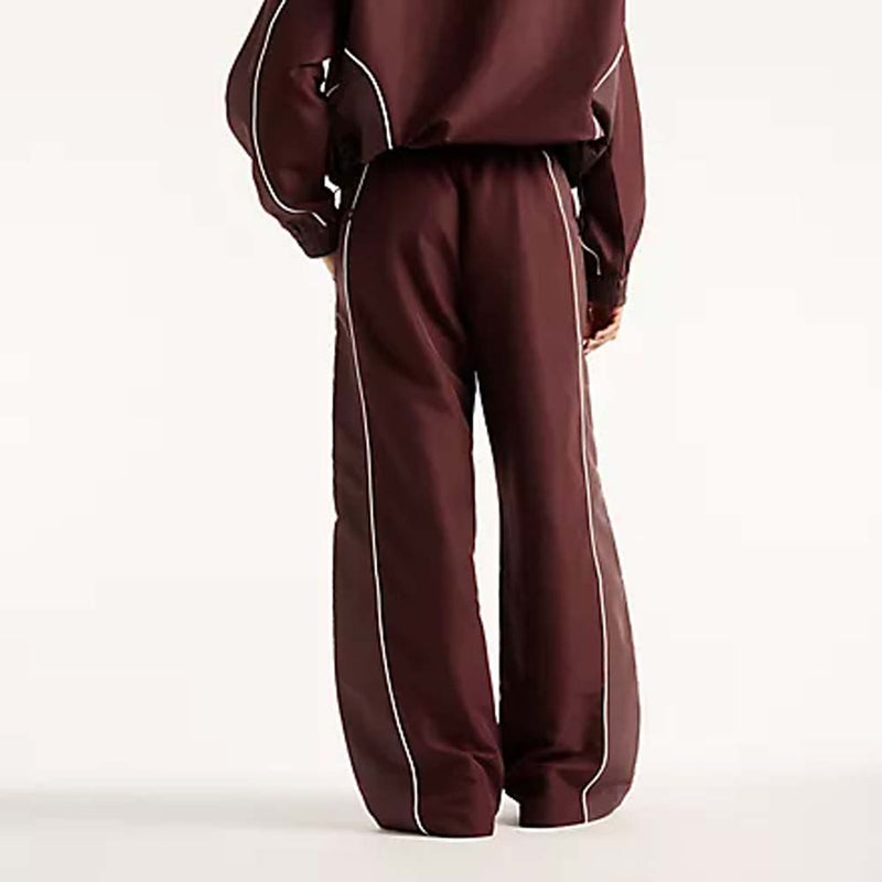 NEW BALANCE Trackside woven pant cherry leather