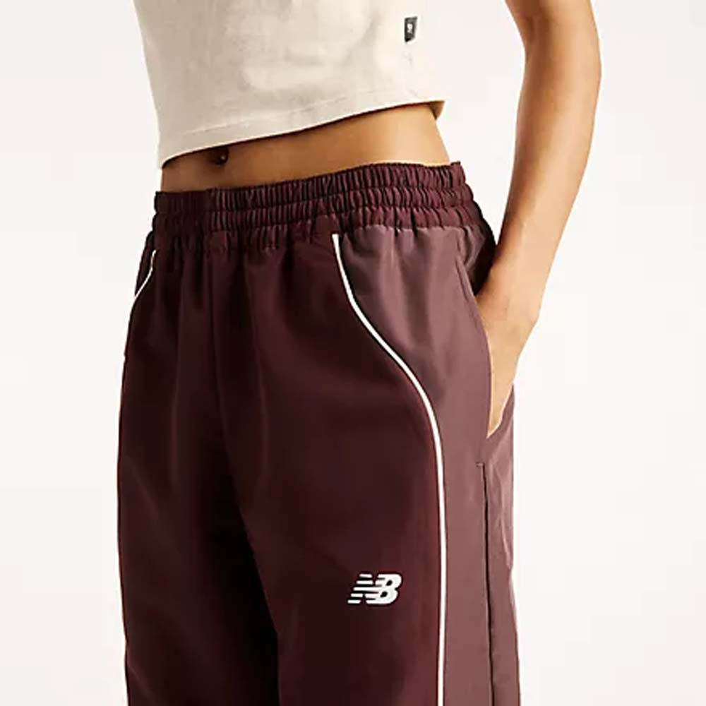 NEW BALANCE Trackside woven pant cherry leather