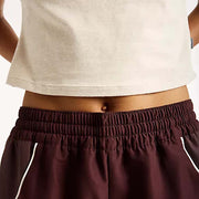 NEW BALANCE Trackside woven pant cherry leather