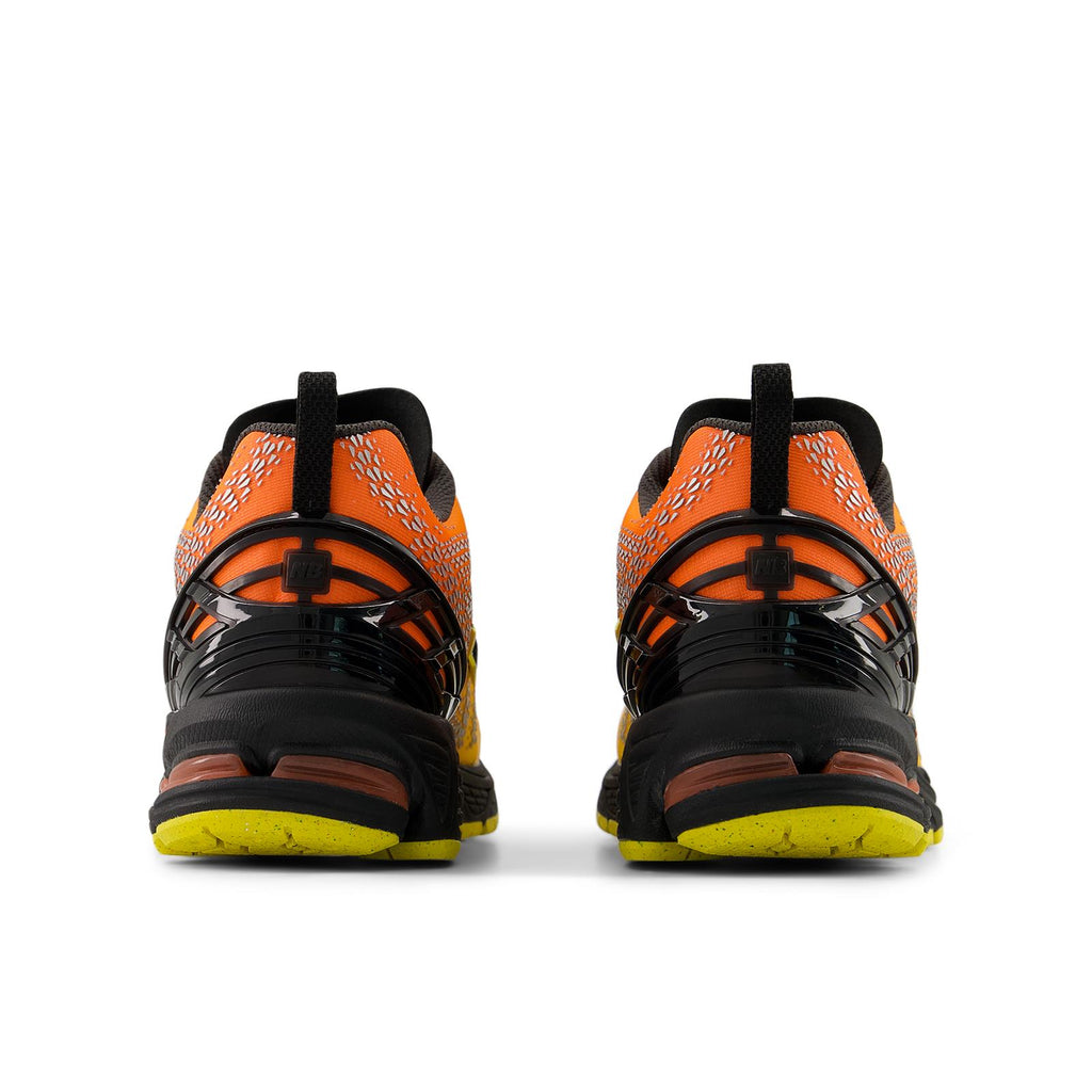 NEW BALANCE U19066QG sneakers punch yellow tangerine heat