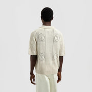 OLAF HUSSEIN Face logo knit polo off white