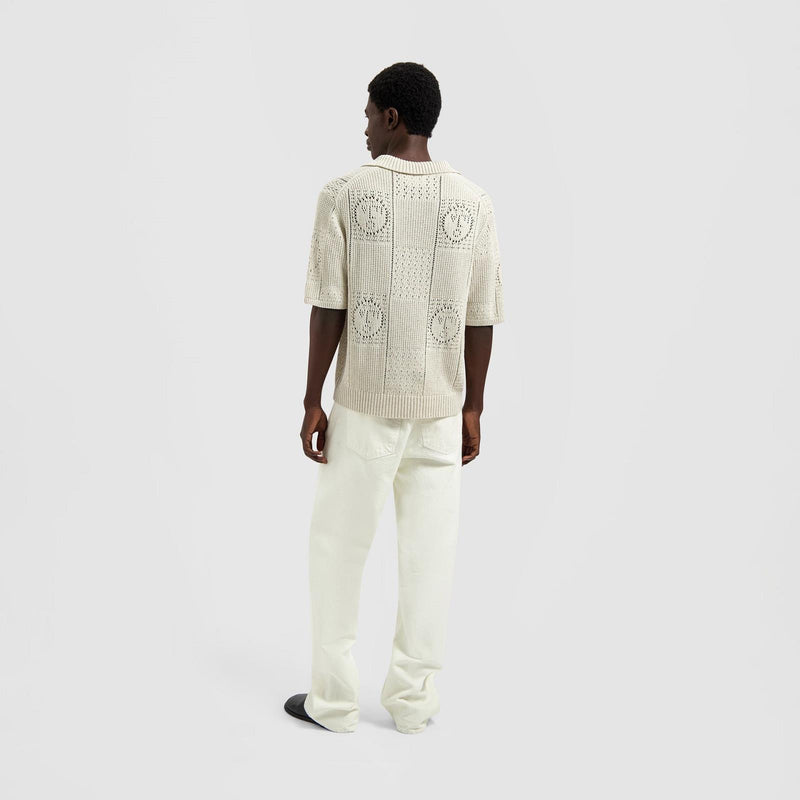 OLAF HUSSEIN Face logo knit polo off white